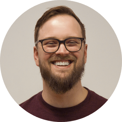 Professional headshot of Kyle Pharo, Director at Tangelo